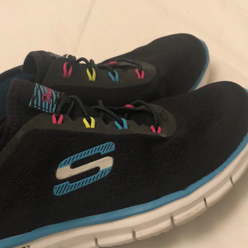 Skechers air cooled memory foam no tie slip on sneakers.